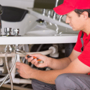 plumber fix a faucet